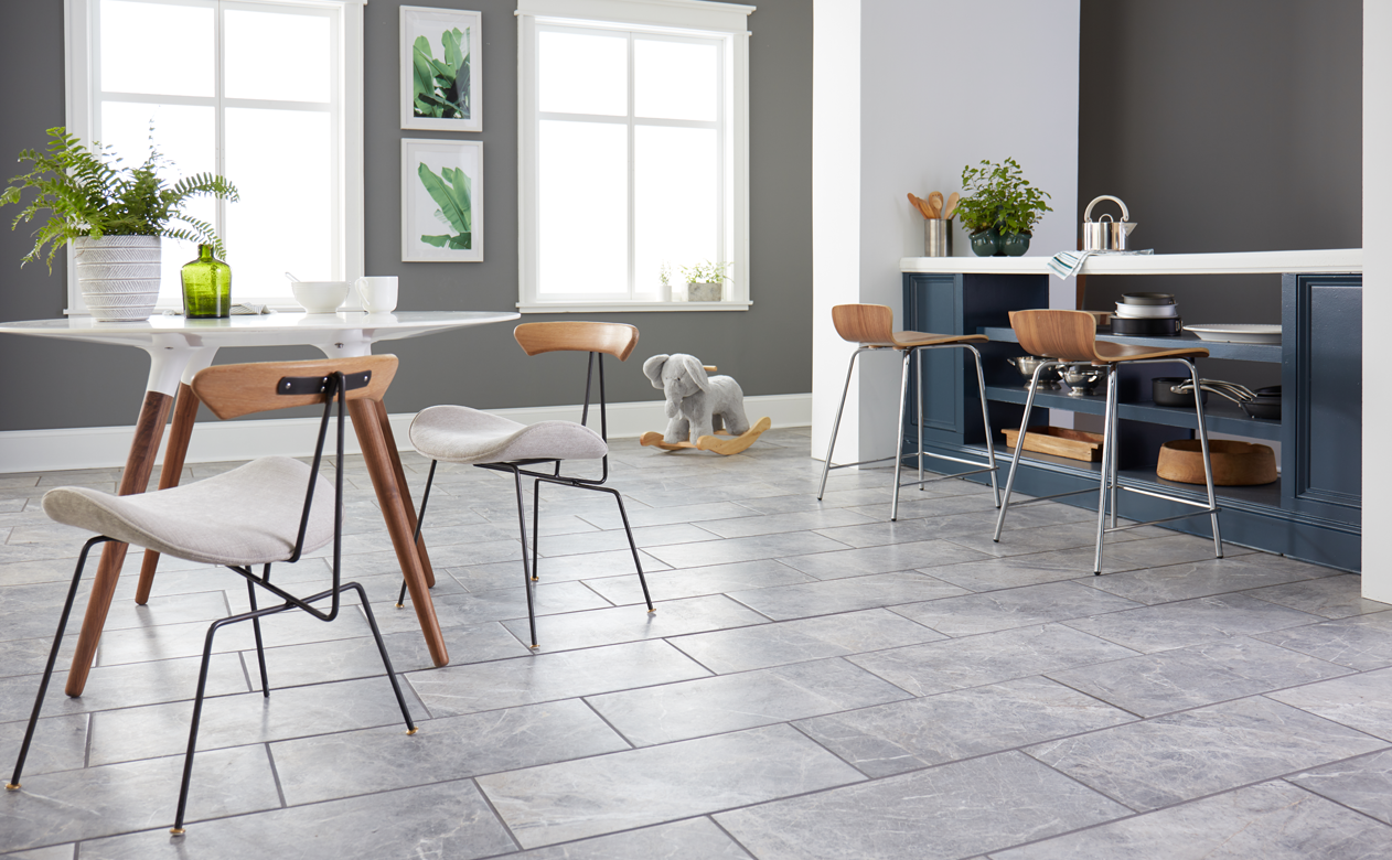 grey tile flooring in kitchen and dining room